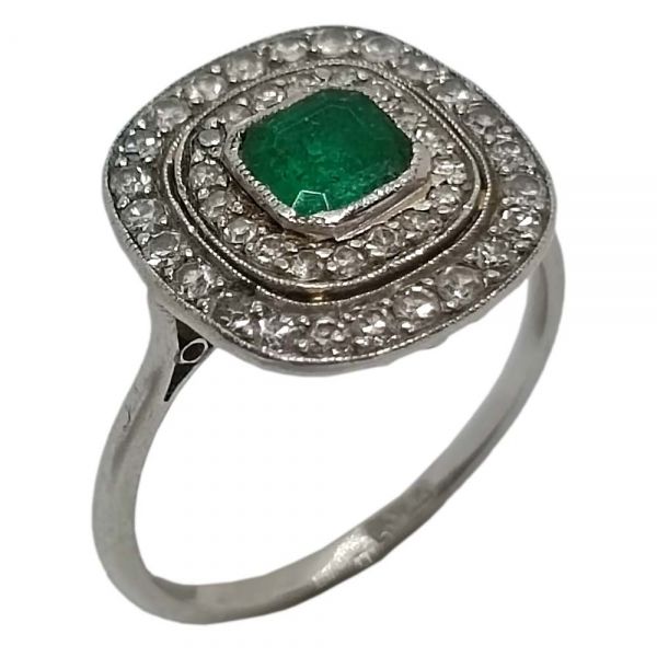 Prsten od platine s dijamantima i smaragdom